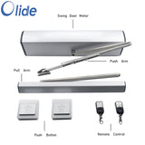 Components of an electric swing door opener system, including the motor, push and pull arms, buttons, and remote control.